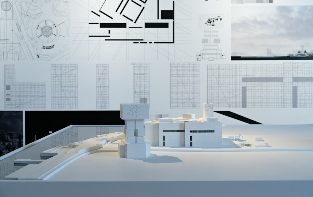 Whiteboard covered with software architecture diagrams
