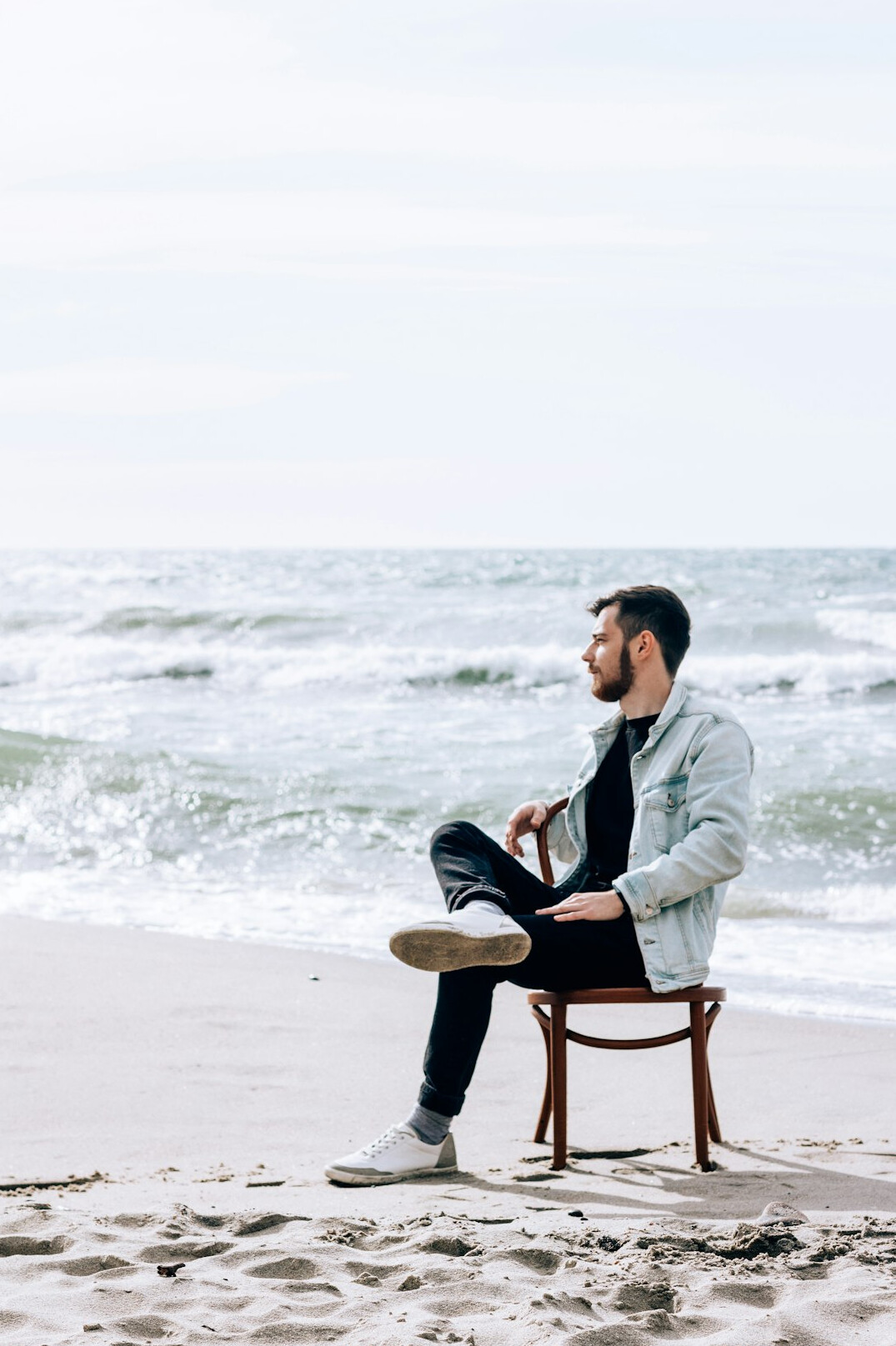 person coding on beach